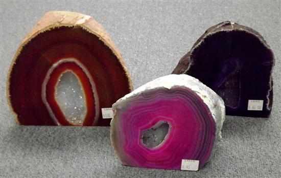 Appraisal: AGATE COLLLECTION Brazil Two agate halves accompany a pair of