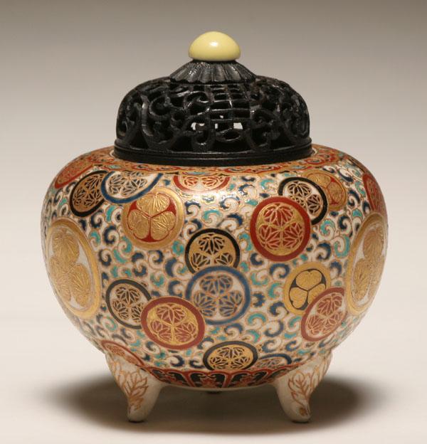 Appraisal: Chinese ceramic lidded jar carved wooden lid rests upon ceramic