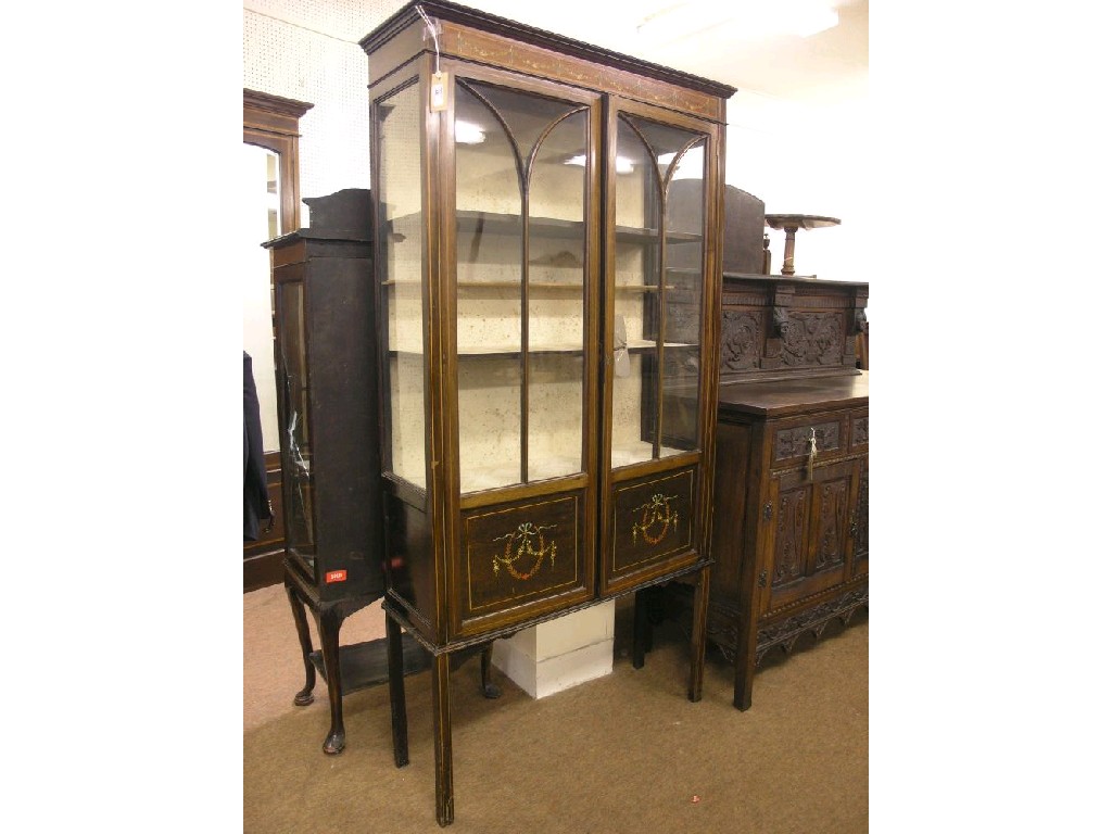 Appraisal: An Edwardian mahogany display cabinet with painted detail pair of