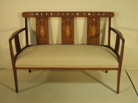 Appraisal: EDWARDIAN STYLE MOTHER OF PEARL INLAID MAHOGANY SETTEE The rounded