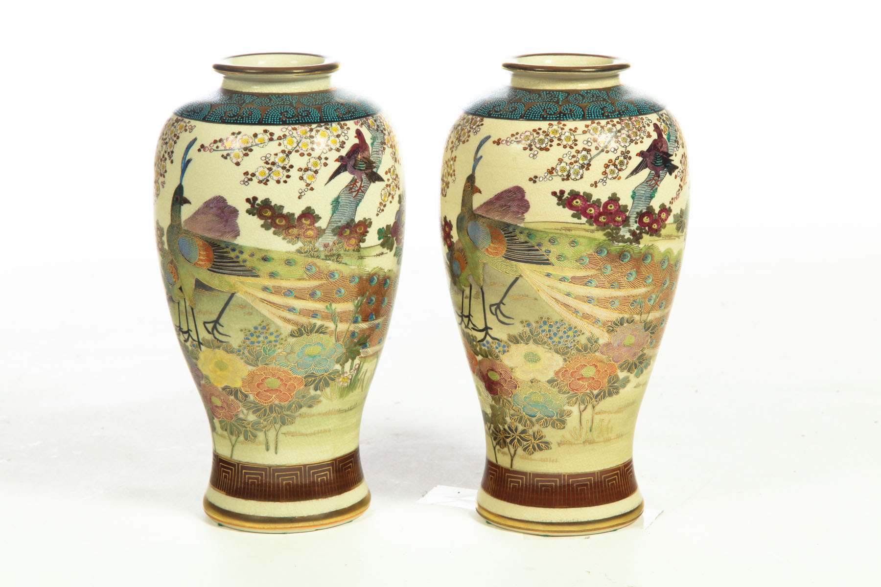 Appraisal: PAIR OF SATSUMA VASES Japan th century Peacocks and flowers