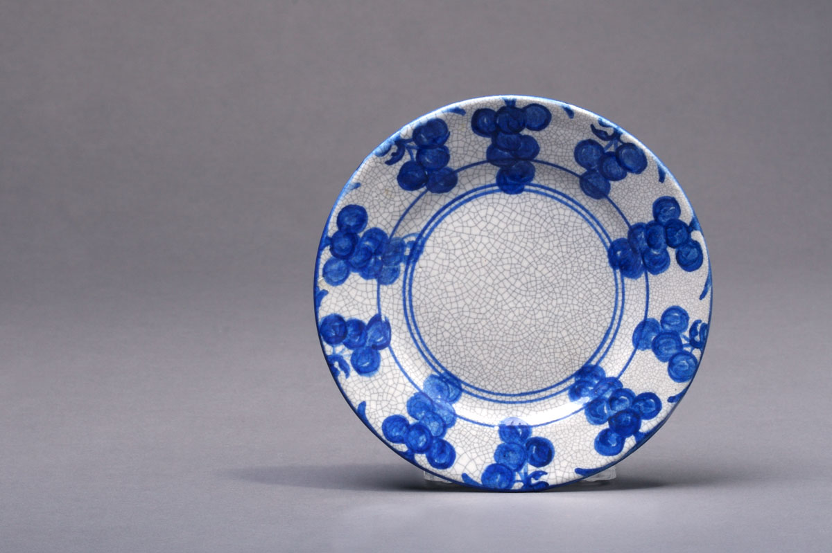 Appraisal: DEDHAM POTTERY 'GRAPE' PATTERN BREAD AND BUTTER PLATE Painted in