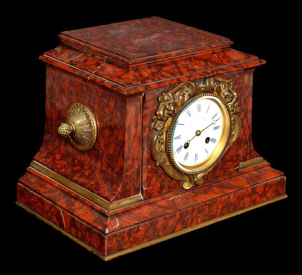 Appraisal: A French gilt metal mounted rouge marble mantel clock Retailed