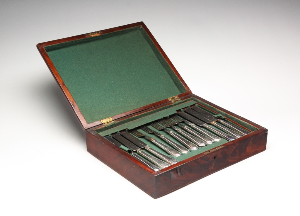 Appraisal: Ca Mahogany veneered box with removable tray Includes twelve forks