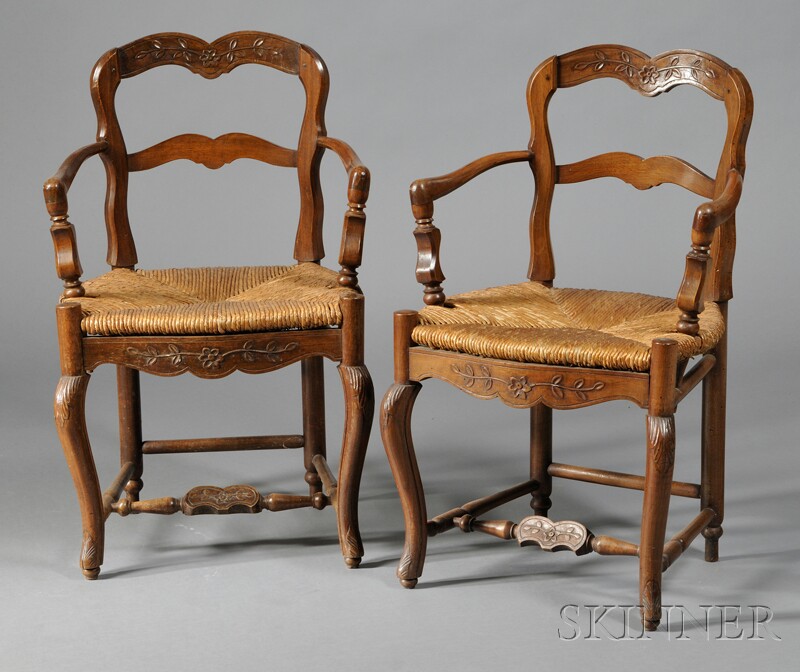 Appraisal: Two Provincial Armchairs France th century with low relief floral