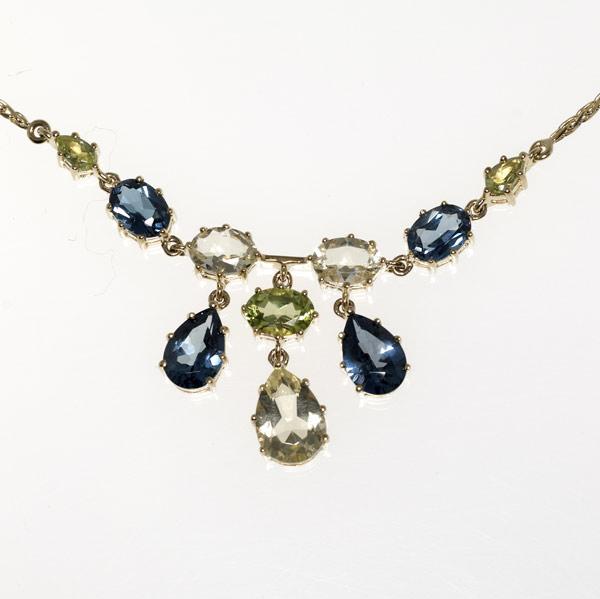 Appraisal: GEMSET FESTOON NECKLACE With three drops k yg Golden beryl