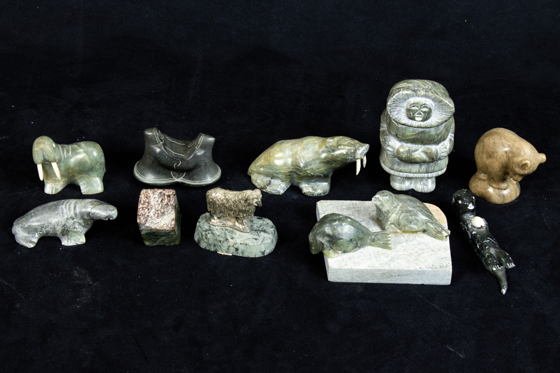 Appraisal: LOT OF INUIT SOAPSTONE CARVINGS lot of Inuit soapstone carvings