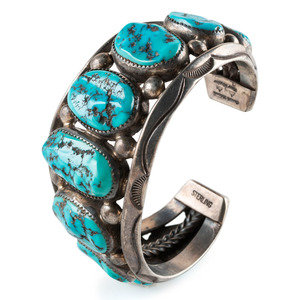 Appraisal: Orville Tsinnie Din - Sterling Silver and Morenci Turquoise Cuff