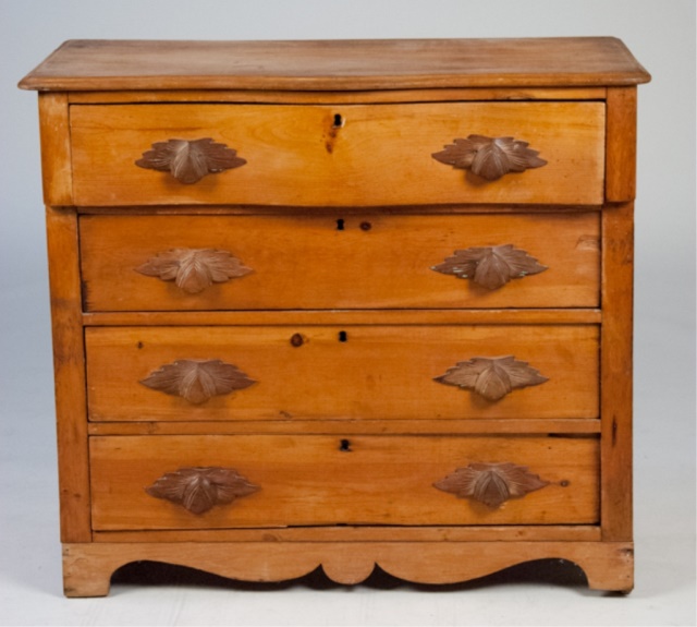 Appraisal: Country Victorian Four Drawer Chest With carved fruit drawer pulls