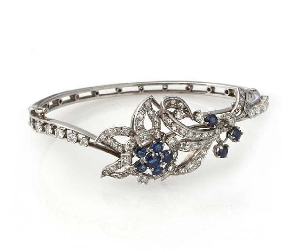 Appraisal: A sapphire diamond and white gold bangle size in