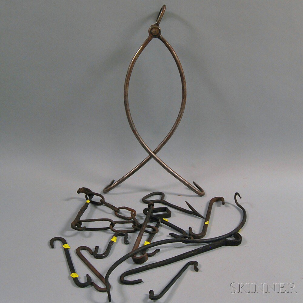 Appraisal: Thirteen Wrought Iron Hooks ht to wd to in Estimate