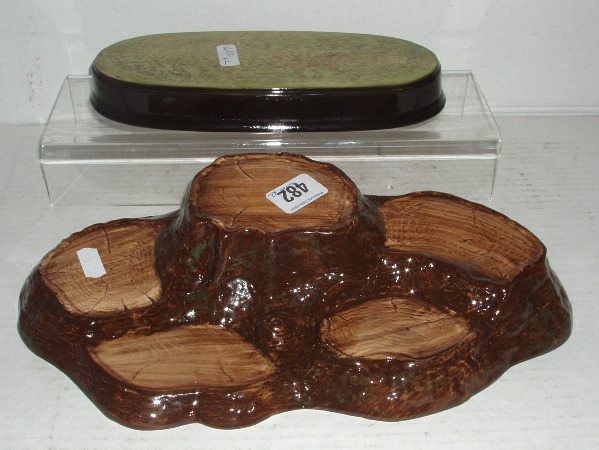 Appraisal: Treetrunk Display Stand and Oval Grassy Display Stand