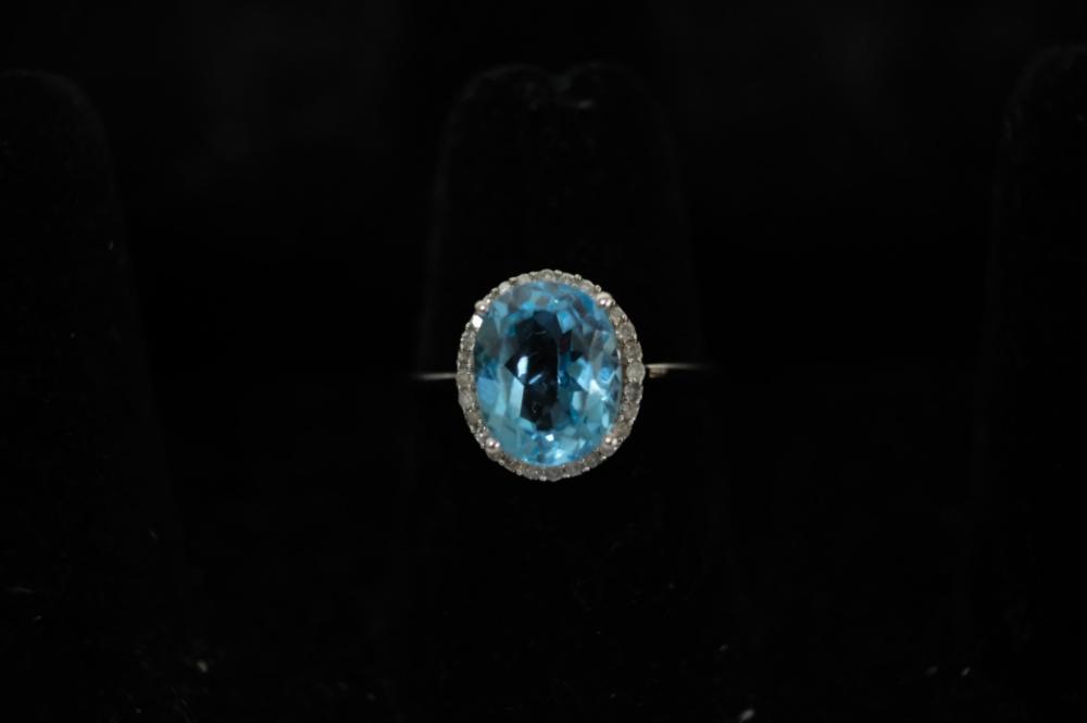 Appraisal: WHITE GOLD TOPAZ RING W DIAMONDS SZ k White gold