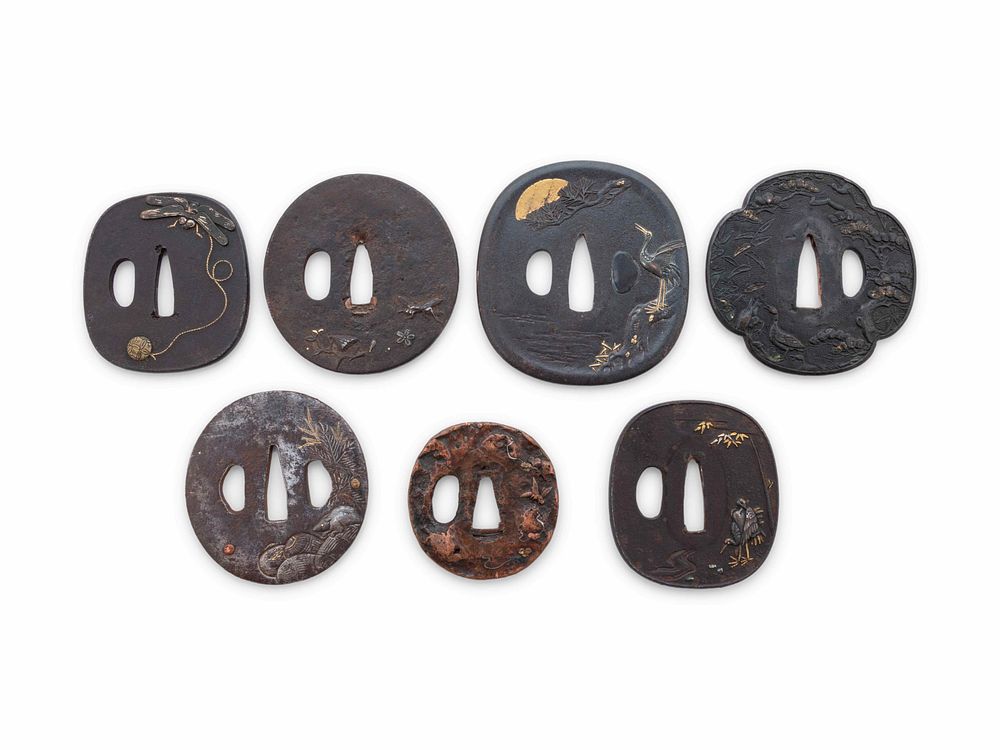 Appraisal: Seven Inlaid Iron Tsuba Seven Inlaid Iron Tsuba the first