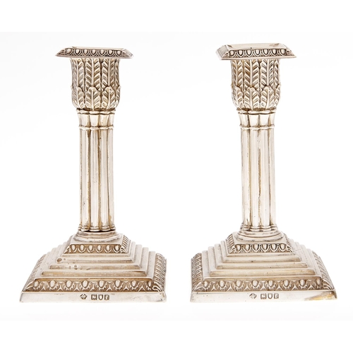 Appraisal: A pair of Edward VII silver dwarf cluster columnar candlesticks