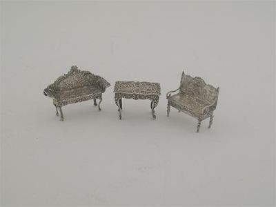 Appraisal: Three various decorative items of miniature a table a settle