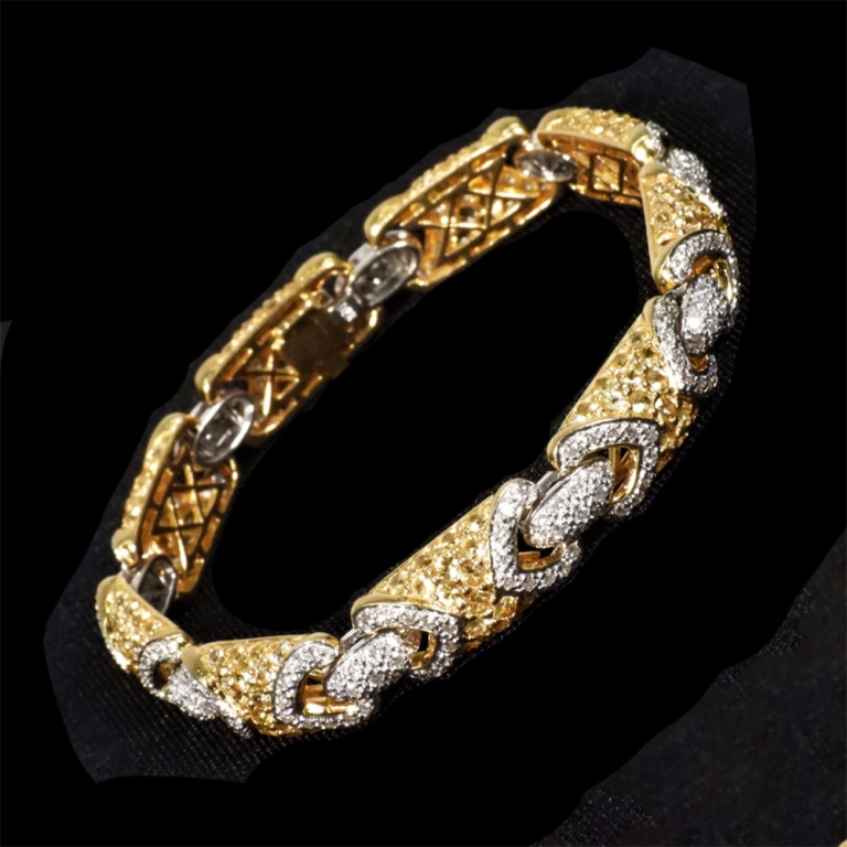 Appraisal: K GOLD SAPPHIRE DIAMOND BRACELET brilliant cut yellow sapphires totaling