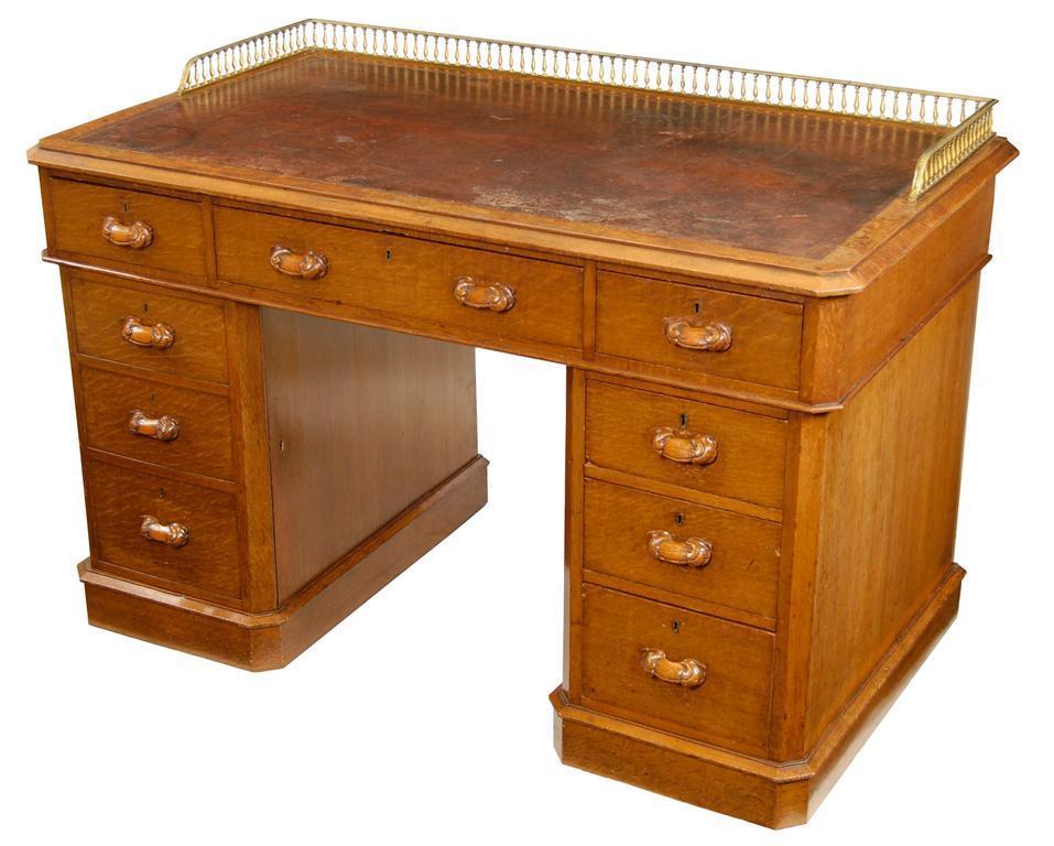 Appraisal: A late Victorian oak twin pedestal desk