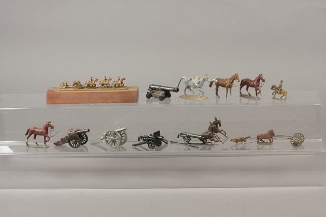 Appraisal: Lot of metal artillery pieces horses together with a small