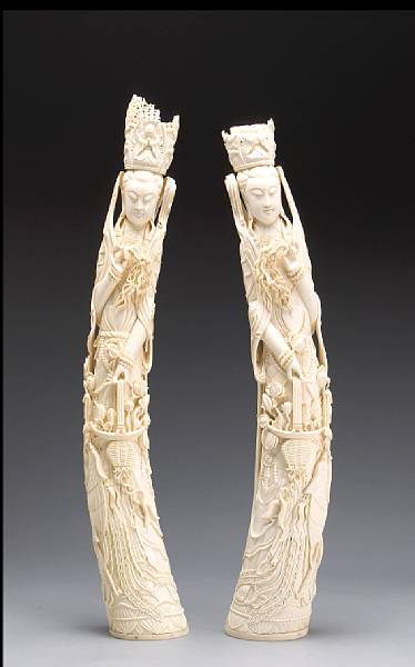 Appraisal: A pair of large carved ivory figures of Guanyin th