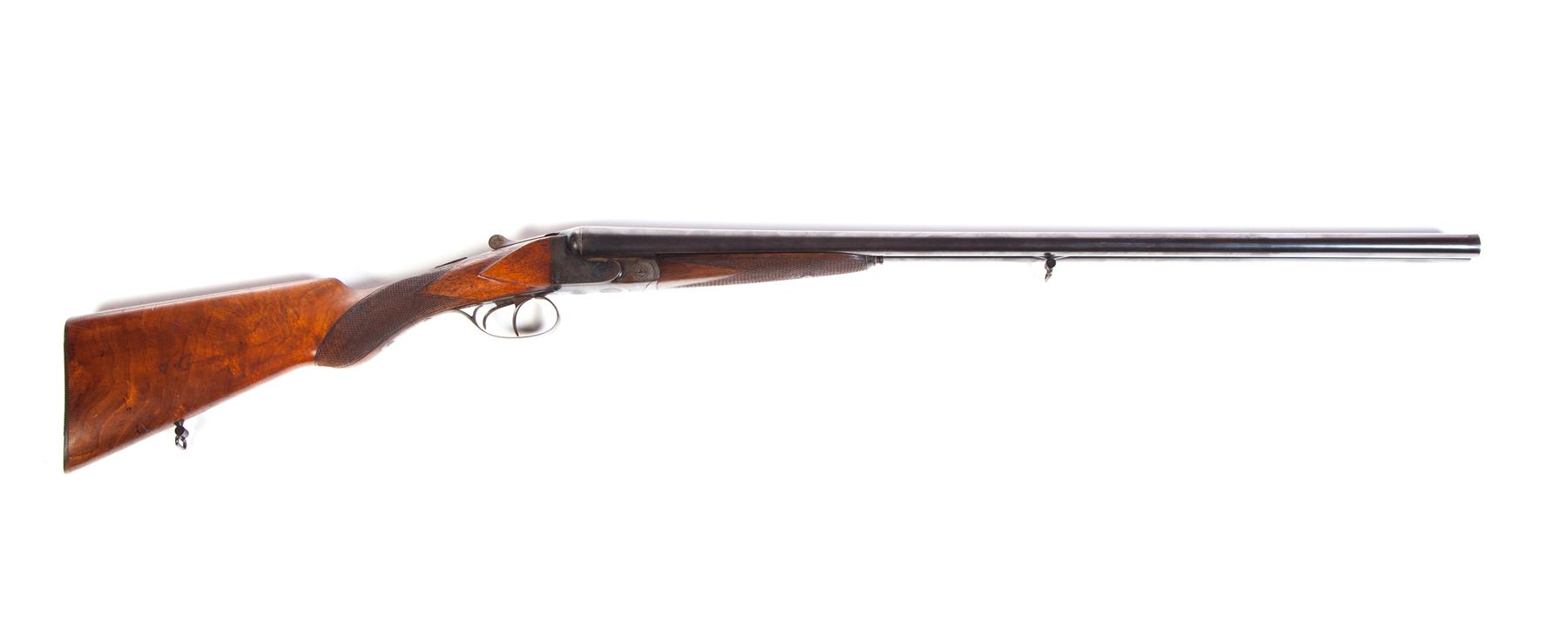 Appraisal: FRENCH SIDE-BY-SIDE GAUGE SHOTGUN Circa Walnut checkered stock Barrel shows