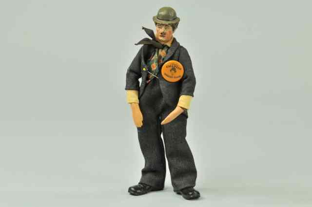 Appraisal: BUCHERER CHARLIE CHAPLIN DOLL Swiss toy cloth dressed and metal