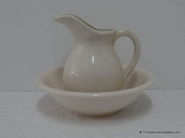 Appraisal: McCoy Speckled Ivory Pitcher Bowl Set Both the pitcher and