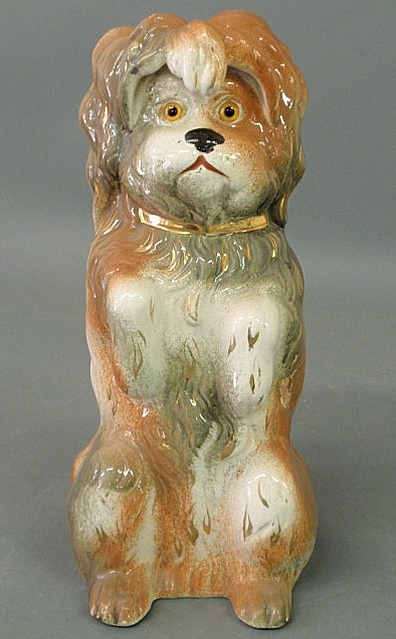 Appraisal: Staffordshire figure of a begging dog with glass eyes c