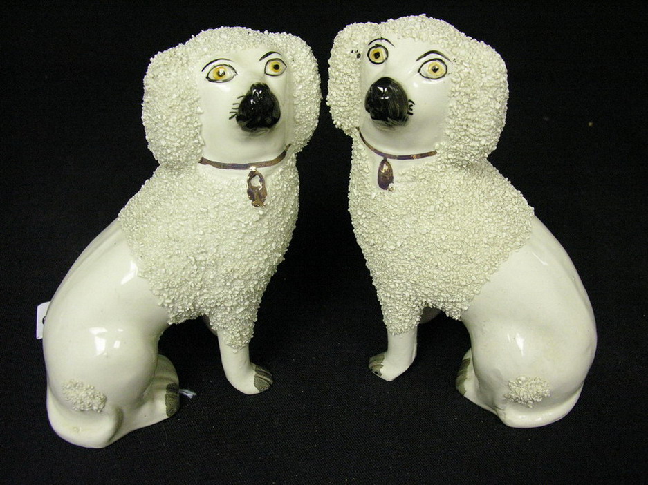 Appraisal: PAIR STAFFORDSHIRE DOGS Marked on base afford Ware England Size