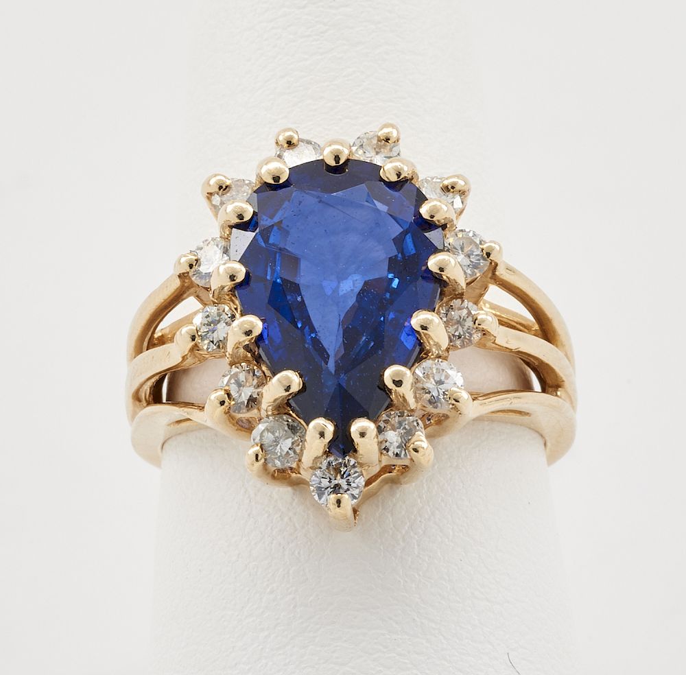 Appraisal: k Yellow gold ct pear shaped sapphire diamond ring k