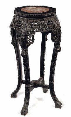 Appraisal: A Chinese carved hardwood jardiniere stand the octagonal top inset