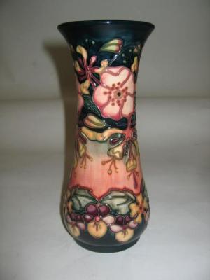 Appraisal: A MOORCROFT POTTERY VASE of waisted form tube lined in