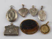 Appraisal: A mixed lot comprising four white metal lockets a white