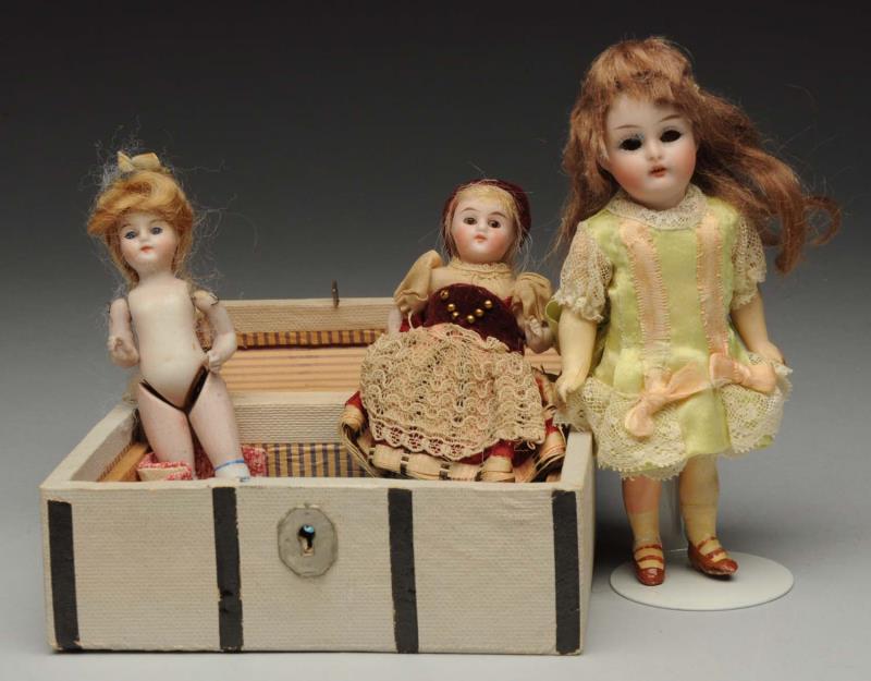 Appraisal: Lot Of Small Dolls Trunk Darling tiny K R Child