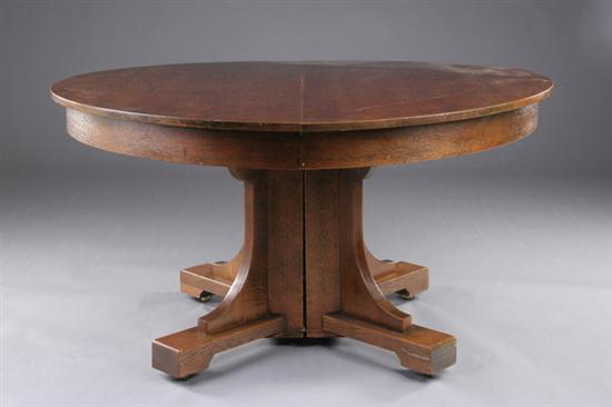 Appraisal: MISSION STYLE EXTENDING DINING TABLE th century with six leaves