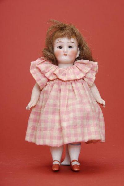 Appraisal: All Bisque Child Doll Germany ca one-piece all bisque doll