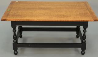 Appraisal: Custom tiger maple coffee table having tiger maple breadboard top