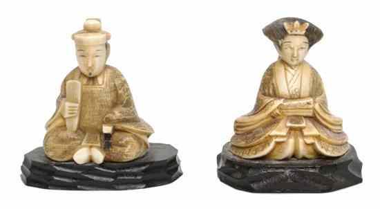 Appraisal: A Pair of Japanese Carved Ivory Figures depicting a male