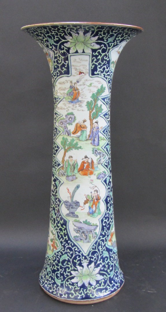 Appraisal: A tall Chinese porcelain blue-ground trumpet vase late th th