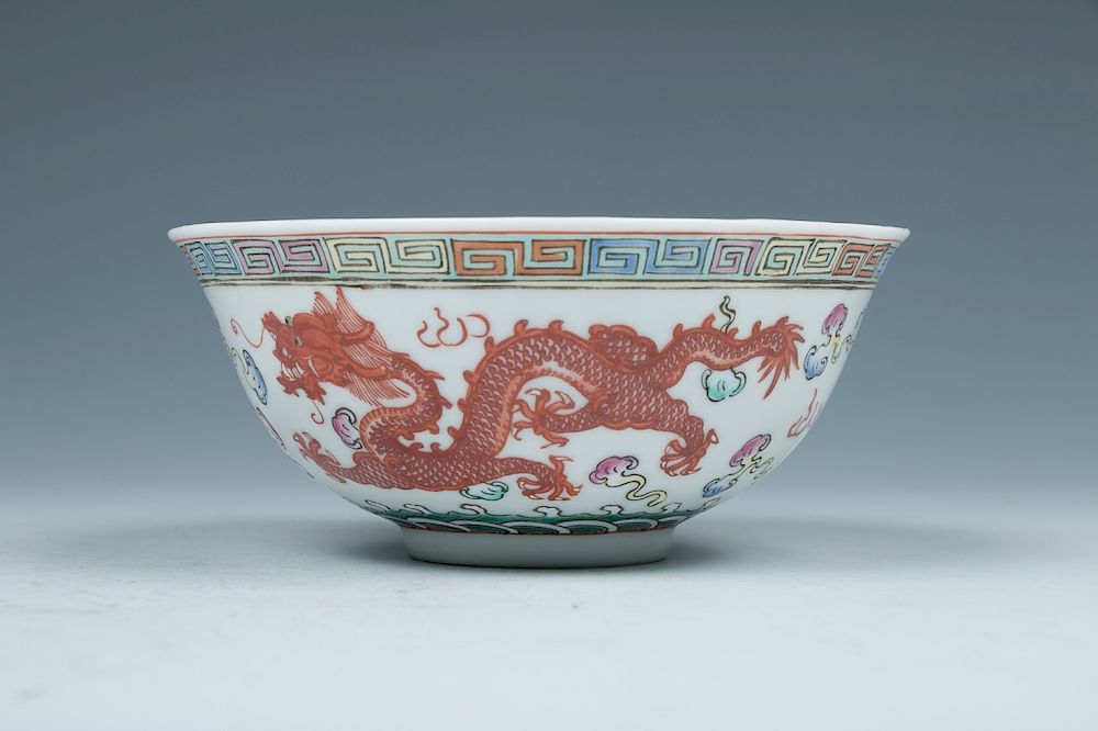 Appraisal: FAMILLE-ROSE 'DRAGON AND PHOENIX' BOWL The bowl of a tapered