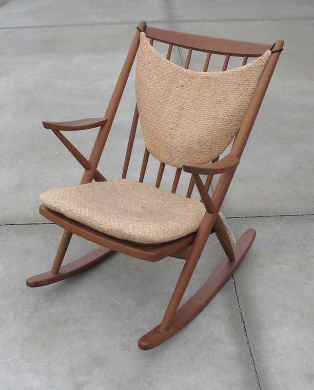 Appraisal: DANISH MODERN TEAKWOOD ROCKING CHAIR Slat back arm chair original