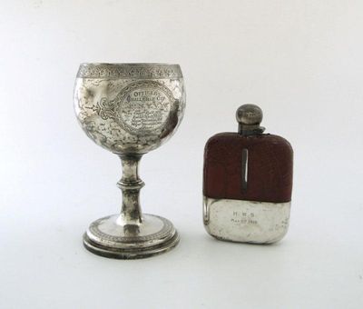 Appraisal: A silver mounted crocodile hip flask of rounded rectangular form