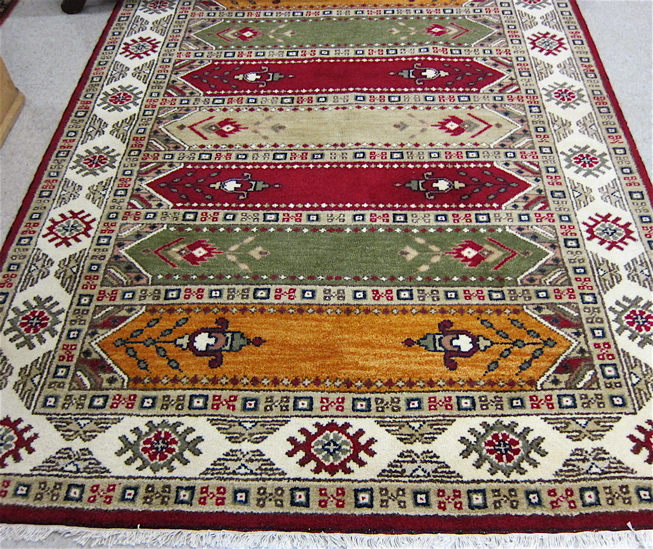 Appraisal: HAND KNOTTED ORIENTAL CARPET Persian Saph design of repeating horizontal