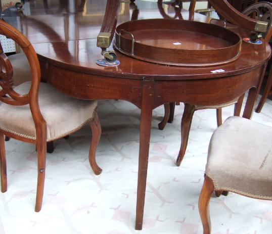 Appraisal: A George III mahogany D end dining table with wavy