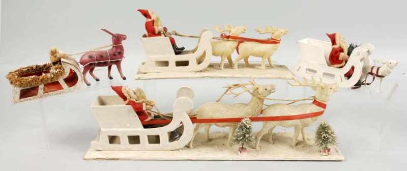 Appraisal: Lot of Santas with Sleigh Reindeer Description Japanese Condition Excellent