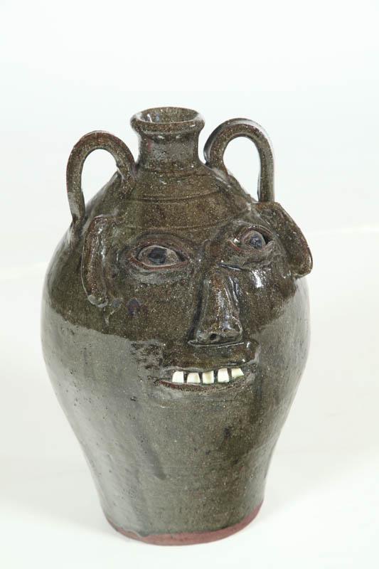 Appraisal: GROTESQUE JUG North Carolina th century redware Initialed for B