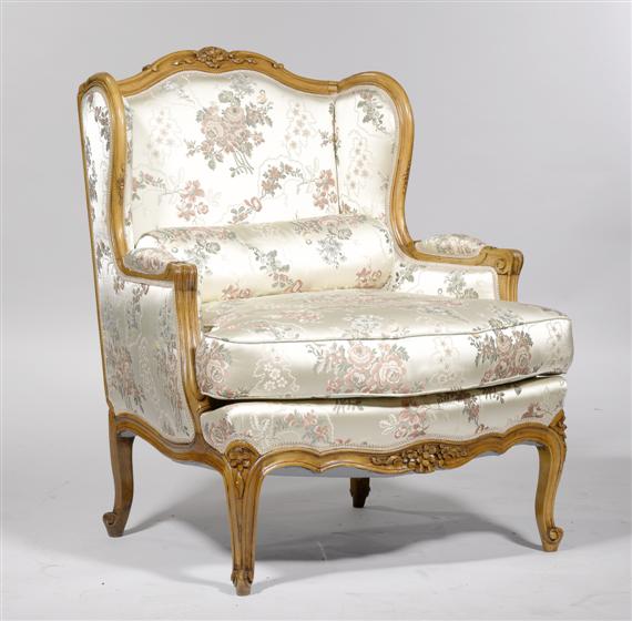 Appraisal: A WINGBACK ARMCHAIR Louis XV style France Molded and carved