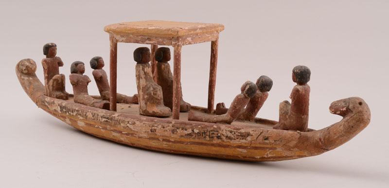 Appraisal: EGYPTIAN PAINTED WOOD MODEL OF A BOAT The elongated hull