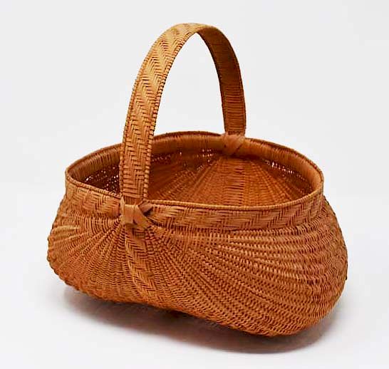 Appraisal: Buttocks basket Finely executed buttocks basket Condition Condition reports for