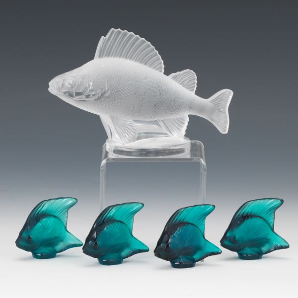 Appraisal: SCHOOL OF LALIQUE FISH One large clear crystal fish signed